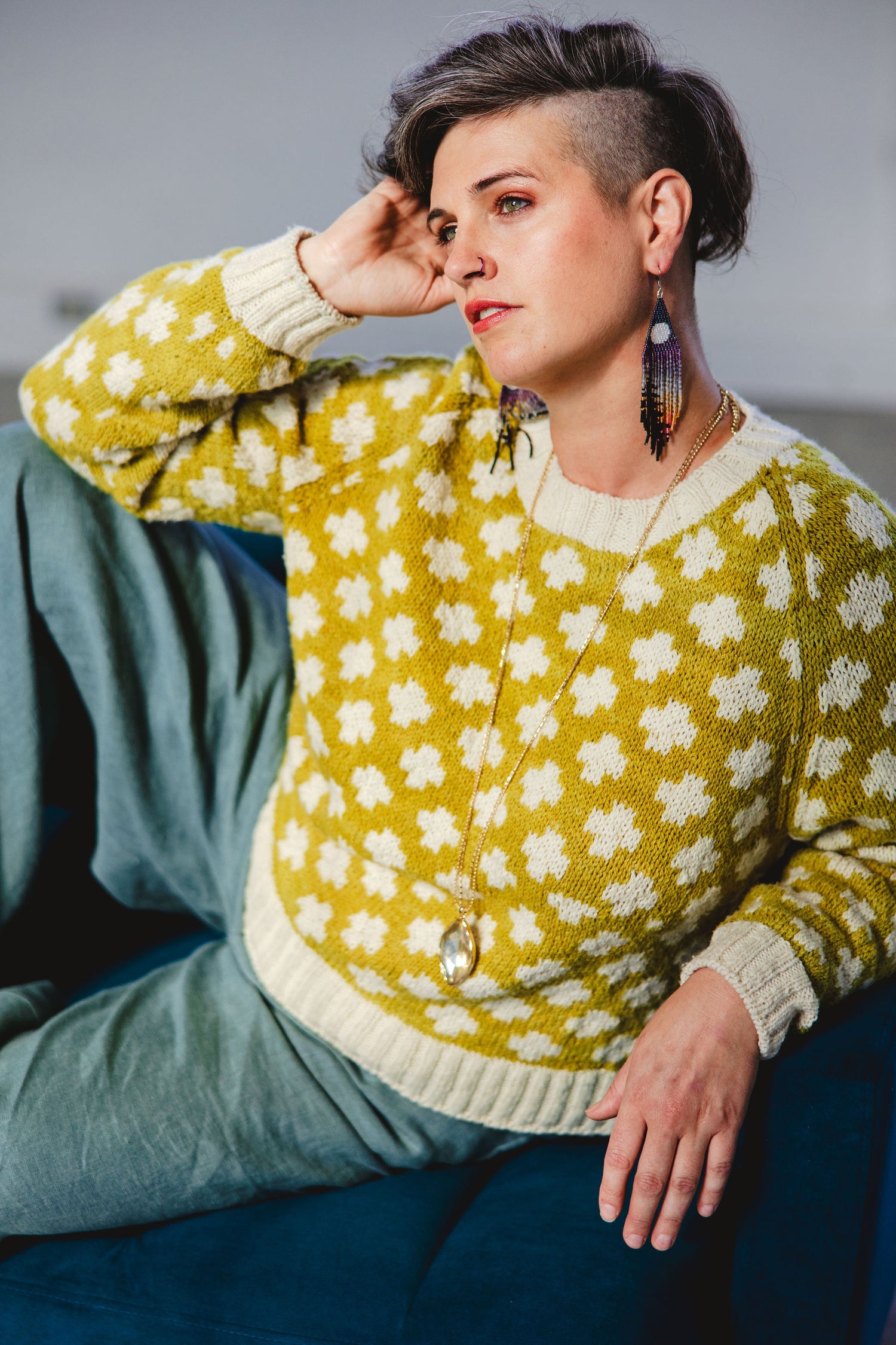 Jen wears Plusses in ochre and cream, an allover colorwork pullover hand knit seamlessly